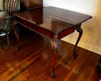 #9 game/ dining table with claw feet leather top pull out legs to make it dining table need leaves 20-60x40x30 $200.00