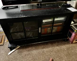 #57 black laminate tv cabinet 46x19x24 $20.00