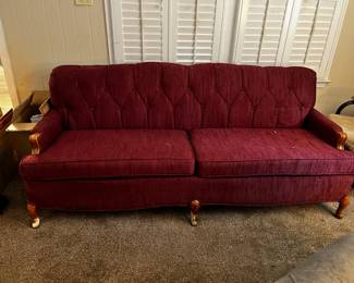 #49 red button back sofa 79 long $50.00