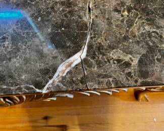 #26 marble top as is crack sofa table with clow feet 54x20x29 $50.00