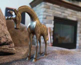 Beautiful midweight solid brass giraffes, mother and baby. Great as shelf décor or paperweights.
Warm patina and tactile texture
Approx. 7" and 3.5" tall