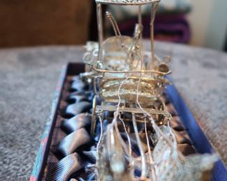 Decorative miniature ox and horse-drawn carts crafted with fine metal filigree-style detailing. These pieces were acquired during the world travels of a retired couple and showcase ornate design and cultural charm. Not silver, but still striking in appearance—perfect for display or resale in home décor or vintage markets.
As a Set: $20–25
Individually: $10–15 each