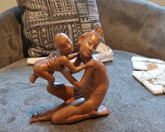 Elegant and expressive wood carving depicting a mother embracing her child.
Intricate detailing, especially in the hair and faces
Likely Balinese or African origin
Smooth finish and solid wood construction
Approx. 10–12” tall