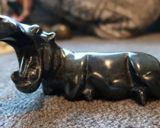 Polished stone carving likely brought back from African travels. Sold individually or as a set.