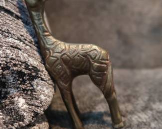 Beautiful midweight solid brass giraffes, mother and baby. Great as shelf décor or paperweights.
Warm patina and tactile texture
Approx. 7" and 3.5" tall