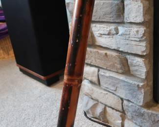 Authentic bamboo rainstick picked up during world travels. Produces a soothing rainfall sound when tipped. Burned accents and colorful thread wrapping. Ideal as a decorative piece or natural percussion instrument.