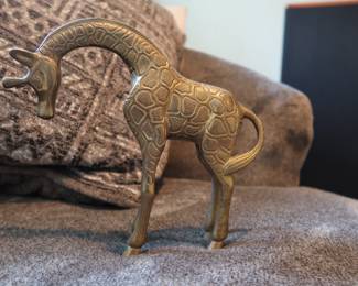 Beautiful midweight solid brass giraffes, mother and baby. Great as shelf décor or paperweights.
Warm patina and tactile texture
Approx. 7" and 3.5" tall