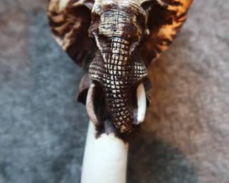 Hand-Carved Elephant Candle Holder – Tribal Design
Decorative elephant-themed candle holder with carved geometric pattern. Likely hand-crafted in Africa or inspired by traditional African art. Material appears to be resin or wood composite. Collected during travels in Africa – artisan piece