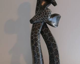 Large Hand-Carved Stone Giraffe
Beautifully etched and polished stone sculpture with stylized form and textured detail. Heavy and substantial.