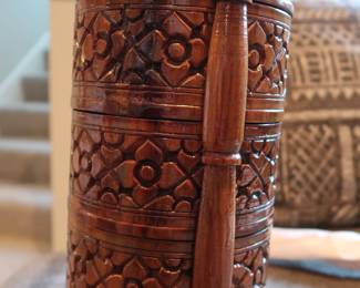 Hand-Carved Wooden Stacking Tiffin
Traditional tiered food carrier from Southeast Asia or India. Intricately carved hardwood with stacking compartments and locking pin. Beautiful global décor piece.