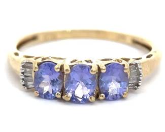 Natural Diamond & Oval Tanzanite Three-Stone Trellis Ring in Yellow Gold