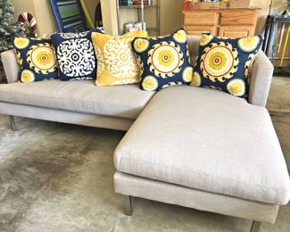 West Elm sectional sofa with pillows