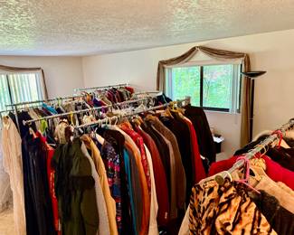 Room full of quality vintage clothes, coats, hats, gloves, handbags
