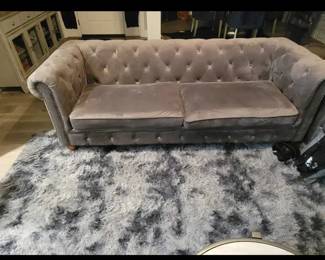 There are identical couches in the home