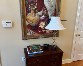 Antique chest, lamp, artwork