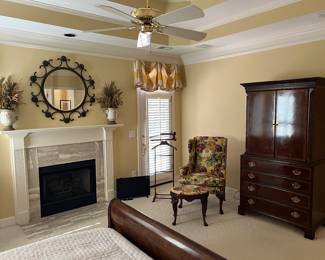 Armoire by Hickory White, wing chair and stool, valet, mirror, tv