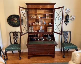 Inlaid secretary, leather books