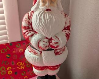 Older, plastic yard Santa ornament