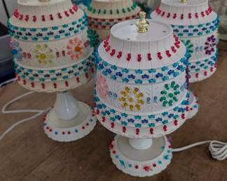 Four cake like lamps