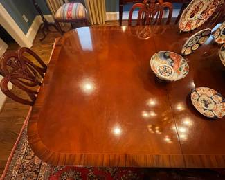 Gorgeous English inlaid Sheraton double pedestal extended table with 2 leaves and 10 chairs