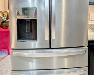 WHIRLPOOL Refrigerator - $1,000 - SUPER condition with water and ice dispenser and middle drawer. Ice dispenser is not working.