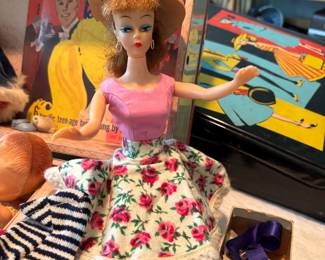 Vintage Barbie with case and clothes