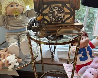German cuckoo clock and cabbage patch kids with adoption papers