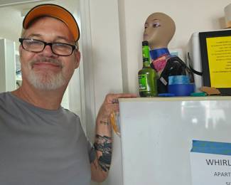 I'm just in the photo to show the height of the fridge