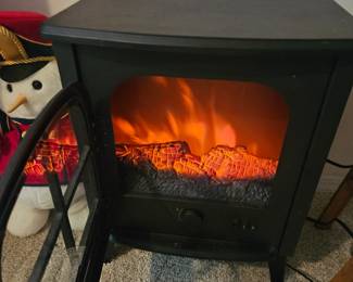 We have two little portable black fireplaces $45 each