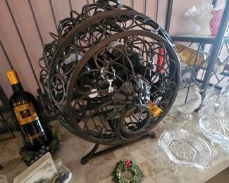 Wrought iron round wine storage device $50