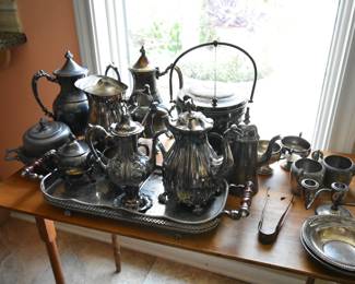 Vast assortment of silver plated serving items