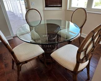 Tommy Bahama Dining Set - not even a year old from Baers - 4 chairs and glass top dining table