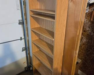 #202	Laminate CD Adjustable 7 shelf Cabinet - 20x6x61	 $30.00 
