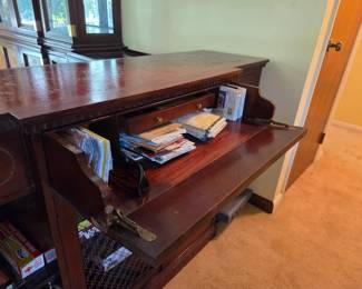 #114	Wood Cabinet w/drop down front drawer that pulls out w/2 wire doors & 2 shelves (as is finish top) & 3 drawers - 57.5x17.5x33	 $75.00 
