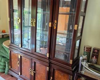 #112	China Cabinet w/4  glass doors & 2 wood doors w/1 drawer & 1 shelf each side w/brass Accents and lighted - ( 2 glass shelves  w/plate rack- Asian Style) - 64x17.5x31-82 - You Move 2 pieces	 $275.00 
