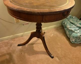 #150	Round Antique End Table w/Brass Feet w/fake drawer (worn leather top) - (as is wear) - 26x26.5	 $50.00 
