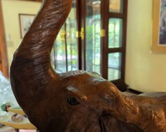 #118	Sculpture of Elephant w/leather ears  - 25"T x 21	 $75.00 
