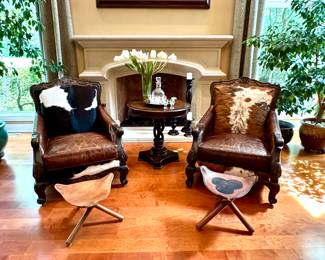 $1800/each, two available (currently sells new for 5459+). Buckley chair in tricolor cowhide. 37" x 33" x 40.5". $1200. vintage round drum table, barley twist pedestal, hand carved mahogany entry stand. 30" x 29". $120/each, two available. Mashi Moosh tripod stand. 16" tall