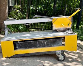 $400. 28" bridge saw. Cuts granite, tile, and stone