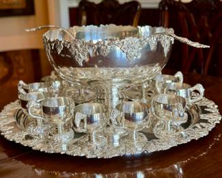$350 Vintage International Silver platter, punch bowl, two ladles, and 12 cups.