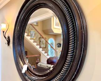 $600. Large beveled round mirror. Frame 56"
