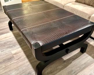 $800 - Faux Alligator/ Leather top coffee table - 50" x 32" x 19"