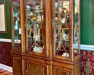 $2400 Thomasville lighted mahogany China cabinet with adjustable glass shelves, three doors, one drawer with paned glass doors; 64L x 17W x 84H