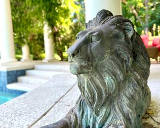 $1500/Each, Two available. Bronze lion at rest. 17" x 35".