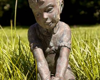 Bronze statue of ponytailed girl with frog. 33" tall