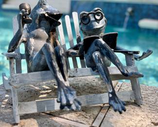 $100. Frog couple metal.