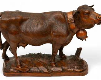 Lot 1047 | French Hand Carved Walnut Sculpture 1890-1920, 'Milking Cow', H 13.75" W 7.5" L 21"