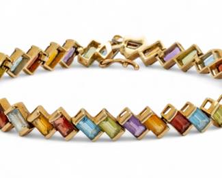 Lot 19 | 14k Yellow Gold And Multi Gemstone Bracelet L 7"