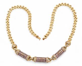Lot 45 | Ruby And Diamond, 18K Yellow Gold Necklace L 16.7"