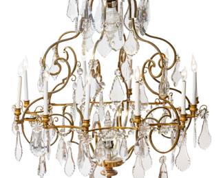 Lot 65 | French Brass And Crystal Twelve Light Chandelier, Ca. 1820-1840, H 42" Dia. 42"